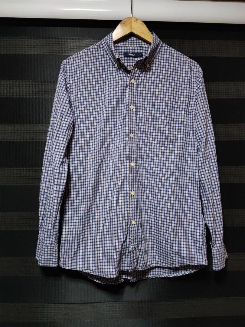 Spao Long Sleeve Button Down Plaid Polo Shirt (Category: Formal Shirts) located in Pasig City. Submitted by abogadosupremo (Listing ID 1463839363, Image 1). Description: Spao Checkered Long Sleeve Polo -Spao long-sleeved shirt features a classic checkered pattern in blue and white. -It has a button-down collar and a single chest pocket. -It's a versatile piece suitable for various occasions. - Very Good Condition - No issue / Legit - Size : Large