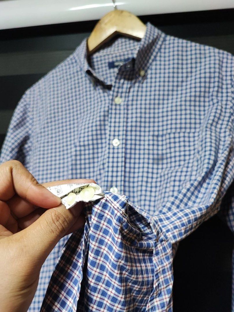Spao Long Sleeve Button Down Plaid Polo Shirt (Category: Formal Shirts) located in Pasig City. Submitted by abogadosupremo (Listing ID 1463839363, Image 3). Description: Spao Checkered Long Sleeve Polo -Spao long-sleeved shirt features a classic checkered pattern in blue and white. -It has a button-down collar and a single chest pocket. -It's a versatile piece suitable for various occasions. - Very Good Condition - No issue / Legit - Size : Large