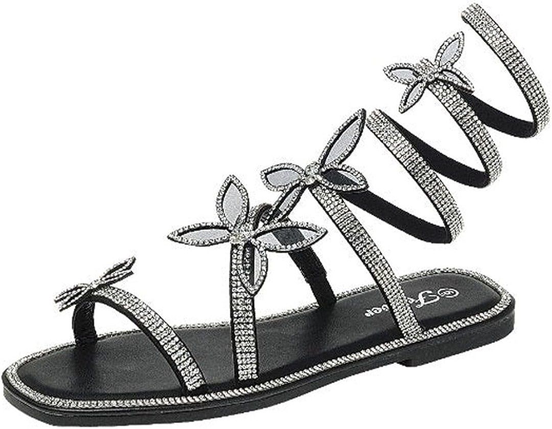 Sparkly Butterfly Wrap Around Gladiator Sandals (Category: Flats & Sandals) located in Angeles City. Submitted by sarisyril (Listing ID 1463788585, Image 2). Description: - Black gladiator sandals - Sparkly butterfly details - Straps wrap around the ankle - Super eye-catching design - Ideal for night outs or special occasions - Very unique.