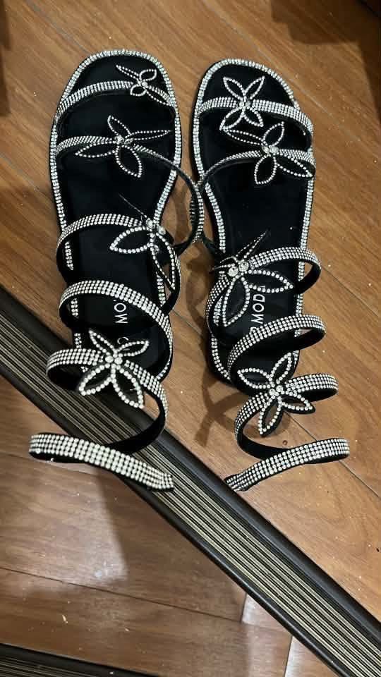 Sparkly Butterfly Wrap Around Gladiator Sandals (Category: Flats & Sandals) located in Angeles City. Submitted by sarisyril (Listing ID 1463788585, Image 3). Description: - Black gladiator sandals - Sparkly butterfly details - Straps wrap around the ankle - Super eye-catching design - Ideal for night outs or special occasions - Very unique.