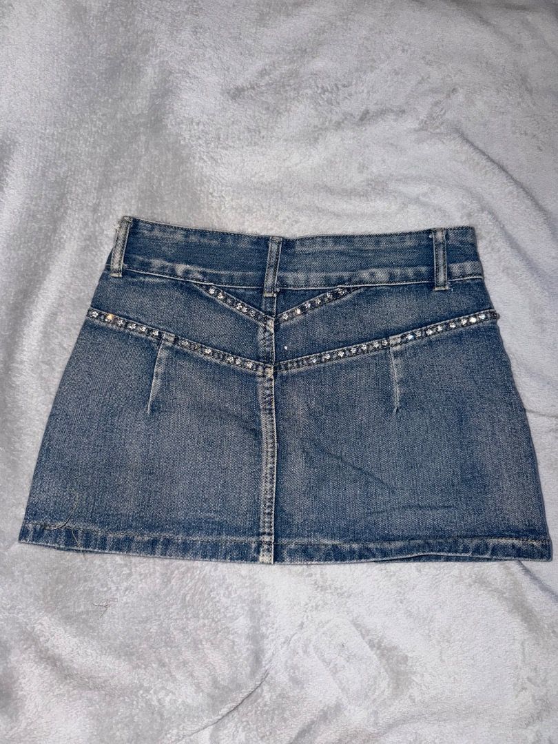 Sparkly Embellished Denim Mini Skirt (Category: Skirts) located in Tarlac. Submitted by ainsleyjudd (Listing ID 1463841004, Image 2). Description: - Slightly washed denim mini skirt - Bejeweled mini skirt details m - Can be worn mid to low waisted style - Small on tag - Can fit to 26-28 waistline.