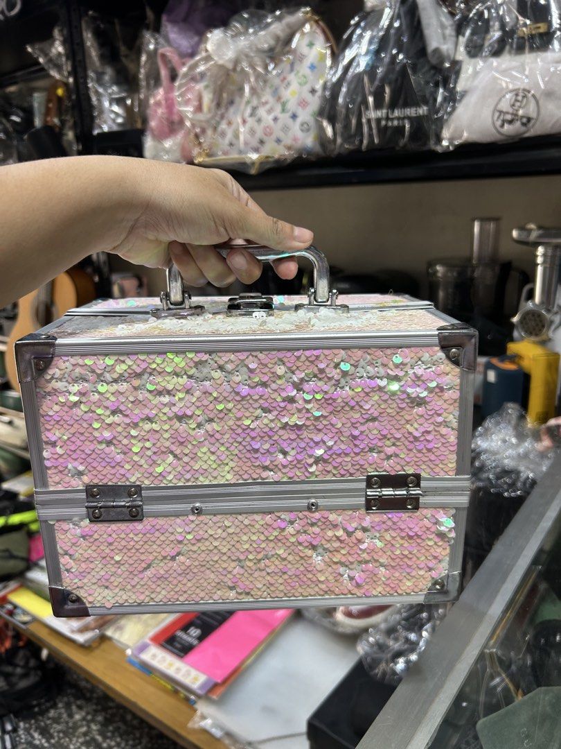 Sparkly Pink Sequin Makeup Train Case with Handle (Category: Luxury Bags & Wallets) located in Manila. Submitted by starbalesukandjapansurplus (Listing ID 1463762727, Image 3). Description: Lagyan na lang ng sticker ang loob - Adorable pink makeup case covered in sparkly iridescent sequins. - Features a sturdy handle for easy carrying. - Secure silver clasps keep your items safe. - Ideal for storing makeup, jewelry, or other small treasures. - Co