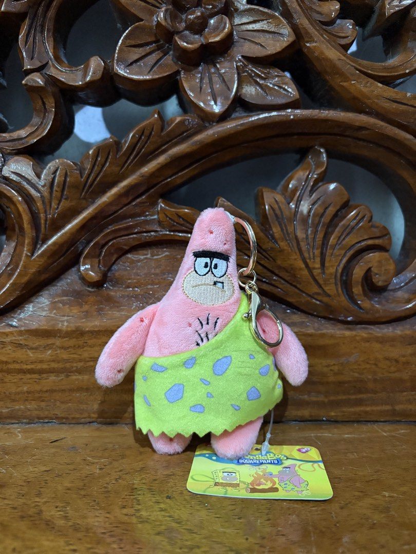 SpongeBob SquarePants Patrick Star Plush Keychain (Category: Plushies & Soft Toys) located in Quezon City. Submitted by rxyel (Listing ID 1463804374, Image 1). Description: - Adorable Patrick Star plush keychain - Features Patrick in his classic caveman outfit - Comes with original tags attached - Ideal collectible for SpongeBob SquarePants fans - Perfect for attaching to bags, keys, or backpacks - Adds a fun touch to your everyday items.