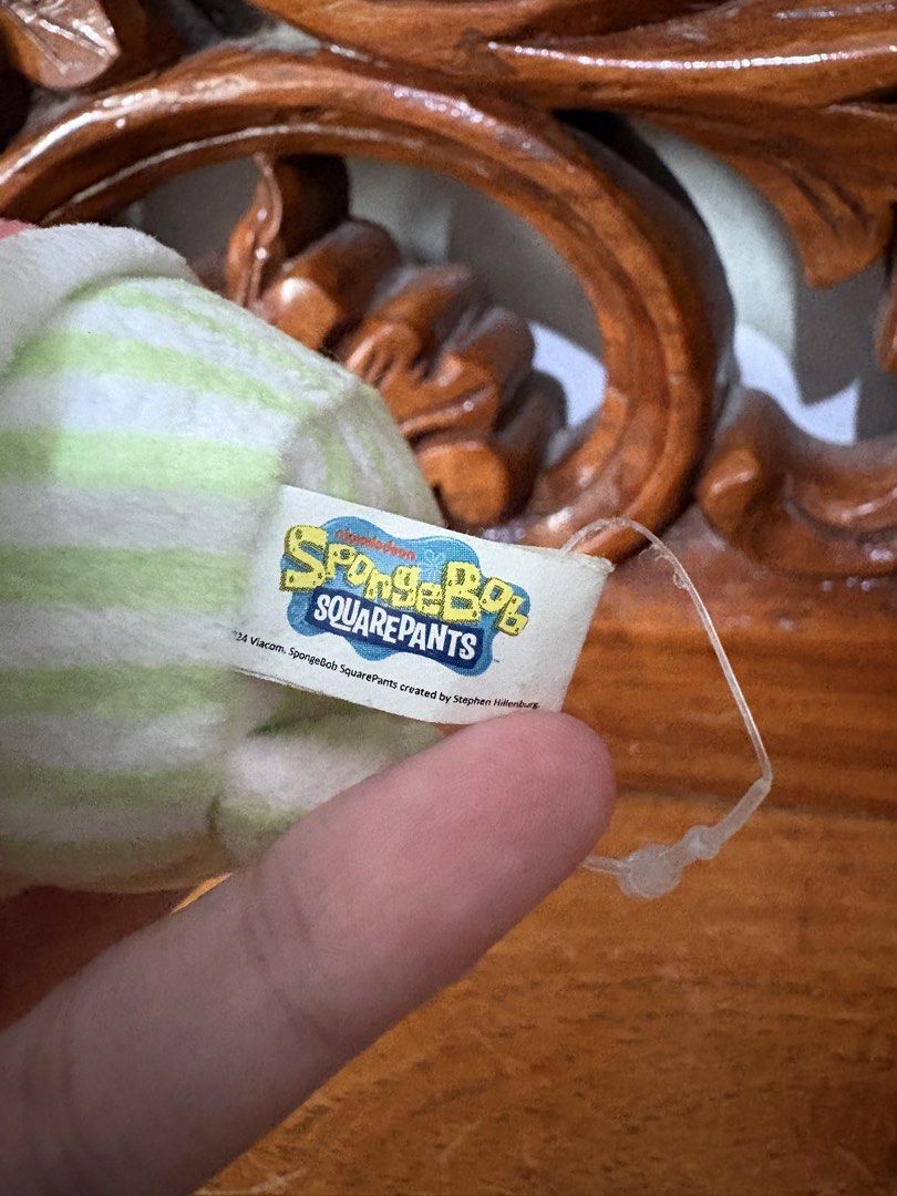 SpongeBob SquarePants Patrick Star Pajamas Plush Keychain (Category: Plushies & Soft Toys) located in Quezon City. Submitted by rxyel (Listing ID 1463804711, Image 3). Description: - Adorable Patrick Star plush toy - Wearing cute pajamas - Features a keychain attachment - Ideal for Spongebob Squarepants fans - Perfect for decorating bags or keys - Brand new with tag still attached.