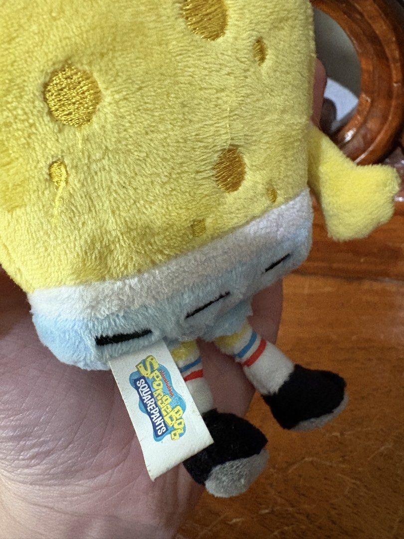 SpongeBob SquarePants Plush Toy Keychain (Category: Plushies & Soft Toys) located in Quezon City. Submitted by rxyel (Listing ID 1463804805, Image 3). Description: - Adorable SpongeBob plush toy - Features a convenient keychain loop - Ideal for fans of the show - Great for decorating bags or backpacks - Compact and portable design.