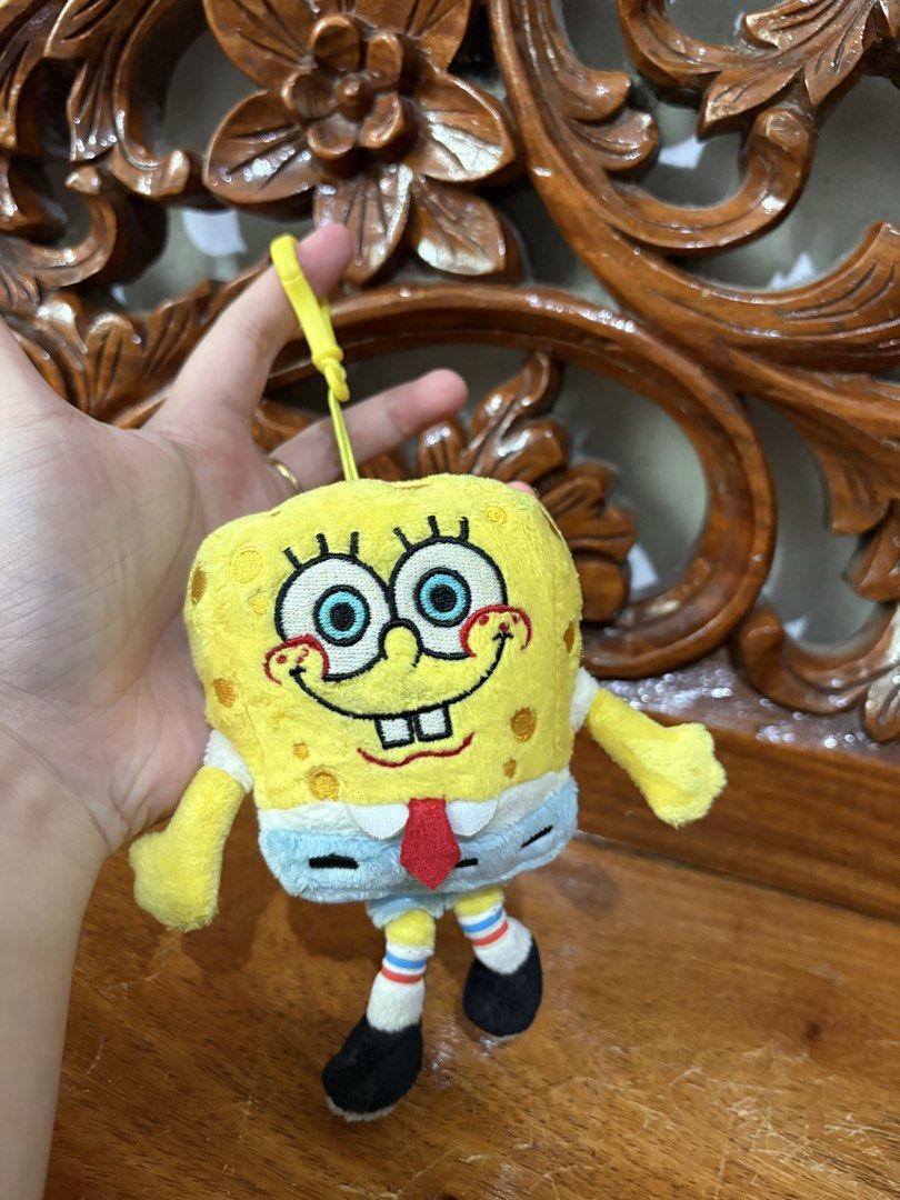 SpongeBob SquarePants Plush Toy Keychain (Category: Plushies & Soft Toys) located in Quezon City. Submitted by rxyel (Listing ID 1463804805, Image 2). Description: - Adorable SpongeBob plush toy - Features a convenient keychain loop - Ideal for fans of the show - Great for decorating bags or backpacks - Compact and portable design.