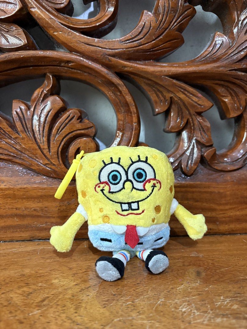 SpongeBob SquarePants Plush Toy Keychain (Category: Plushies & Soft Toys) located in Quezon City. Submitted by rxyel (Listing ID 1463804805, Image 1). Description: - Adorable SpongeBob plush toy - Features a convenient keychain loop - Ideal for fans of the show - Great for decorating bags or backpacks - Compact and portable design.