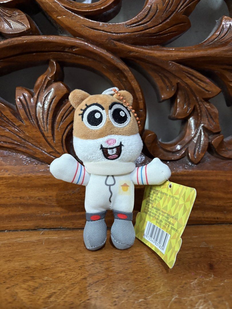 SpongeBob SquarePants Sandy Cheeks Plush Toy Keychain (Category: Plushies & Soft Toys) located in Quezon City. Submitted by rxyel (Listing ID 1463804624, Image 1). Description: - Adorable Sandy Cheeks plush toy from SpongeBob SquarePants. - Features a convenient keychain for easy hanging. - Brand new with the original tag still attached. - Made in China. - A must-have collectible for any SpongeBob fan!.