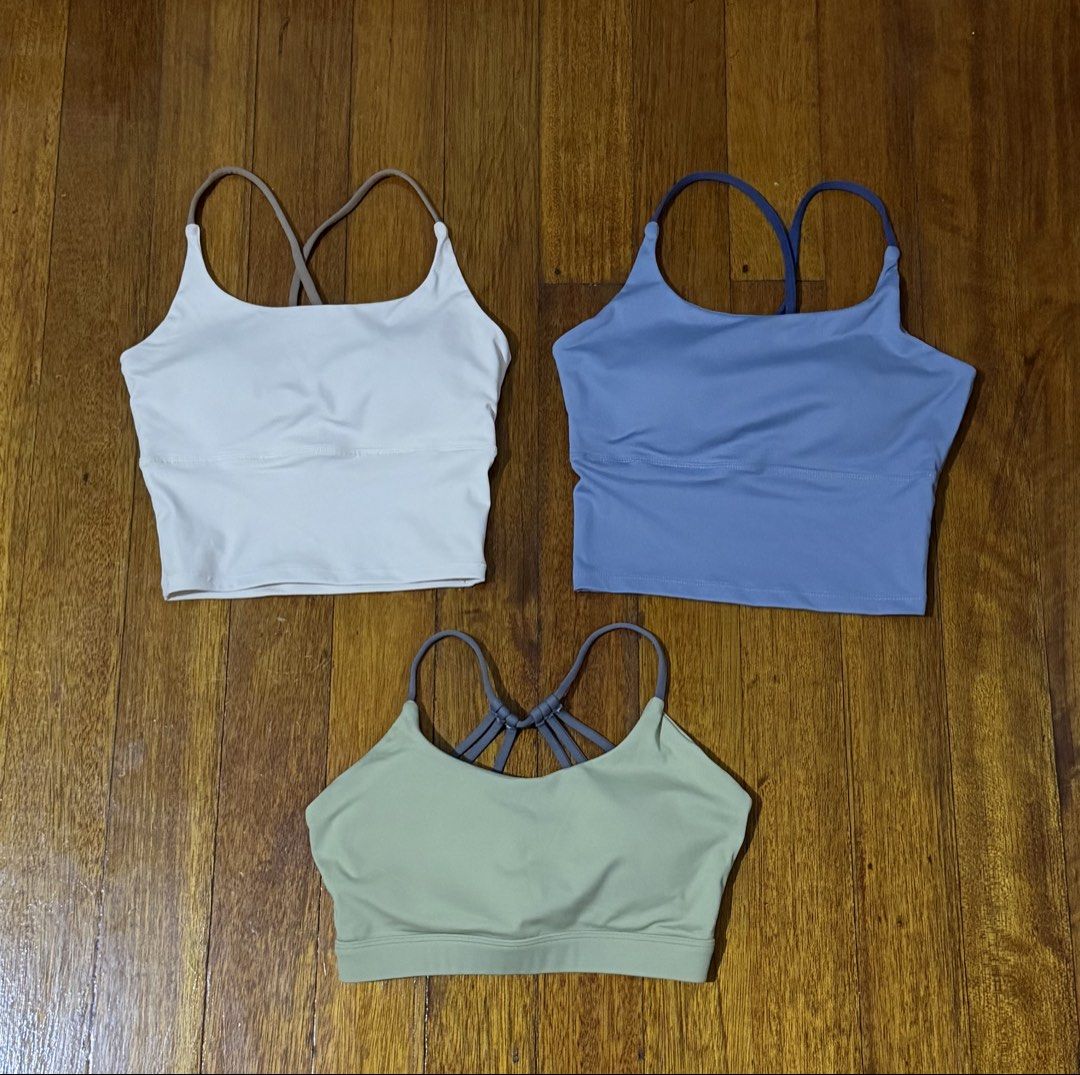 Sports Bra (Category: Activewear) located in Paranaque City. Submitted by declutternsell.729 (Listing ID 1463774195, Image 2). Description: - Bundle includes 3 sports bra crop tops - Colors: White, Blue, Light Green - Design: Criss-cross straps at the back - Versatile: Perfect for workouts or casual wear SOLD AS SET 3 PCS.