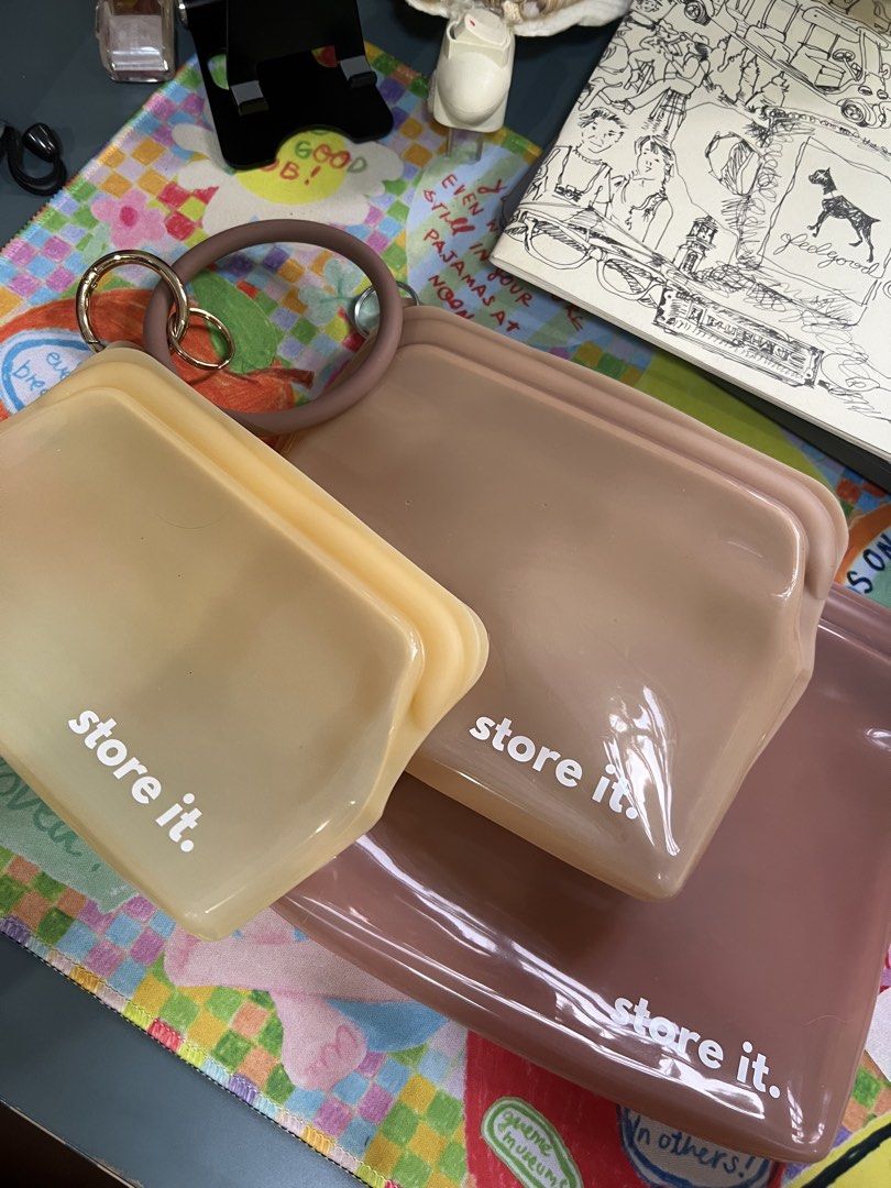 Store It Reusable Silicone Storage Bags Set (Category: Food Organization & Storage) located in Paranaque City. Submitted by guevssss (Listing ID 1463827651, Image 1). Description: Used, but good condition. - Set of 3 reusable silicone storage bags - Colors: Light yellow, beige, dusty rose - Features zip closure for secure sealing - Includes a convenient ring for carrying or hanging - Ideal for storing snacks, organizing travel essentials, or keep