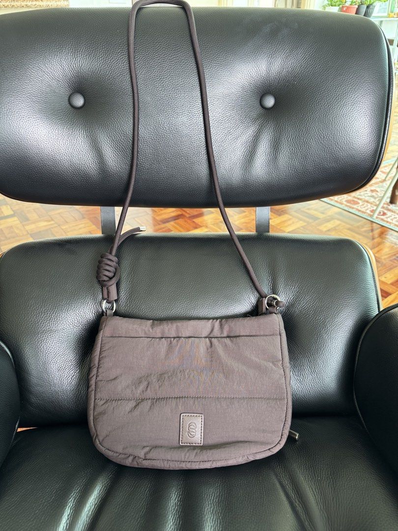Straightforward Wanda Sling in Chestnut (Category: Cross-body Bags) located in Pasig City. Submitted by calumpagpatrise (Listing ID 1463786222, Image 2). Description: - Used only once; during my trip to Siargao - DryTech fabric - Has a magnetic clasp compartment in front + zipper in the main bag - Bought from TT Shop - With Dust Bag - Price is negotiable!! - RFS: I don’t use it anymore.