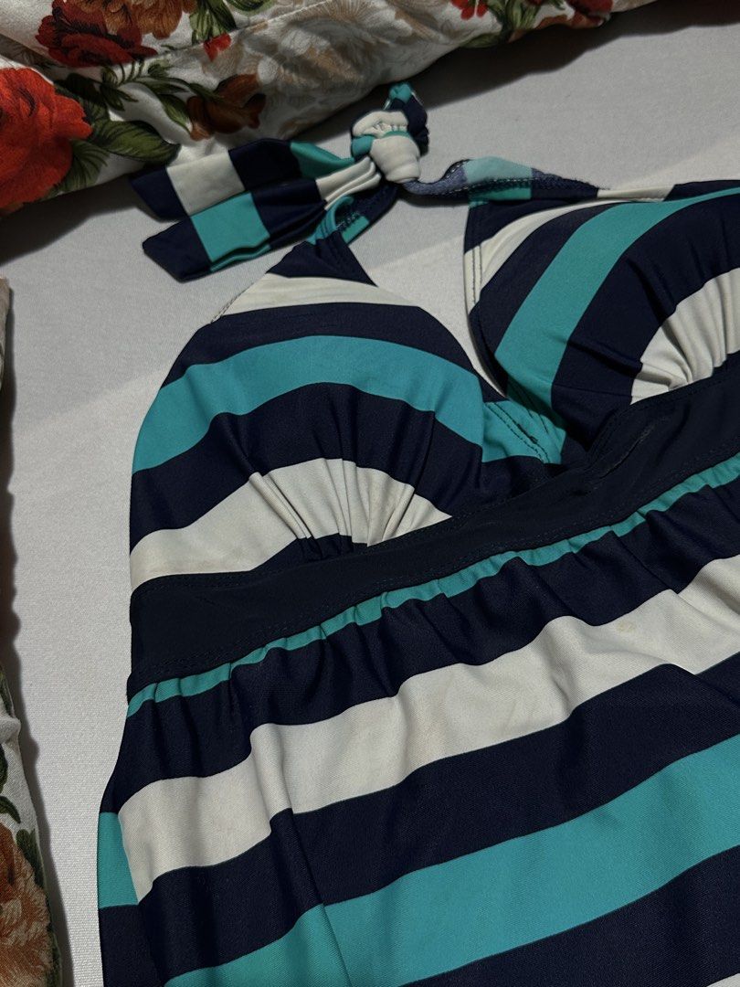 Striped Halterneck Swimsuit Top (Category: Bikinis & Swimsuits) located in Manila. Submitted by erikaerika05 (Listing ID 1463892083, Image 2). Description: PRE-LOVED SWIMWEAR COVER-UP SKIRT - Striped halterneck swimsuit top - Features navy, white, and teal stripes - Ties at the neck - Elasticated band under the bust for support Lightly used — worn only once 🫧 May have minimal washable stains from use/storage 📸 Photo note: Actual color may sligh