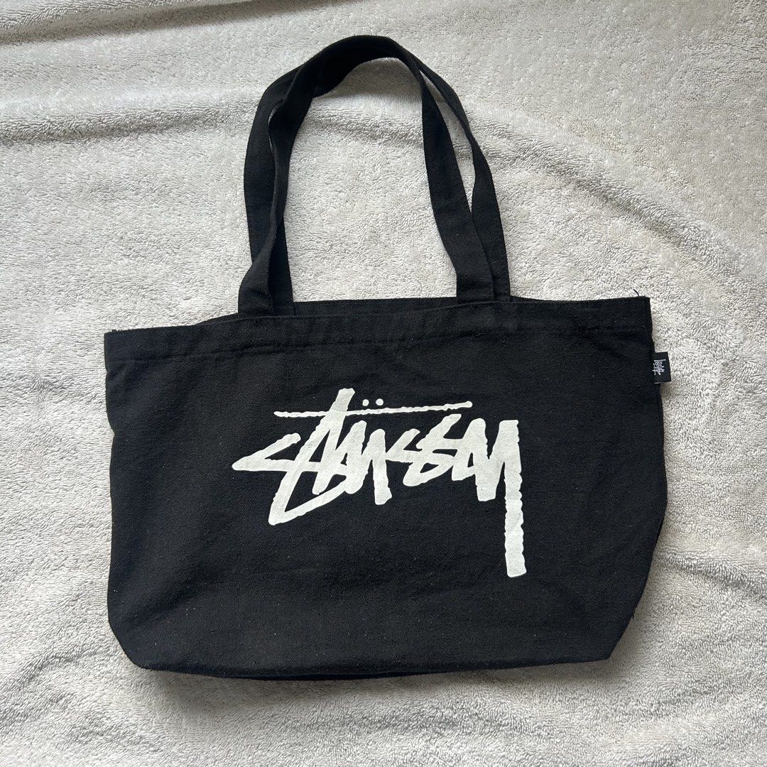 Stussy mini Canvas Tote Bag (Category: Shoulder Bags) located in San Juan City. Submitted by e_declutters2019 (Listing ID 1463786504, Image 1). Description: • damage in the inside pocket • thrifted this on ig - signs of usage .
