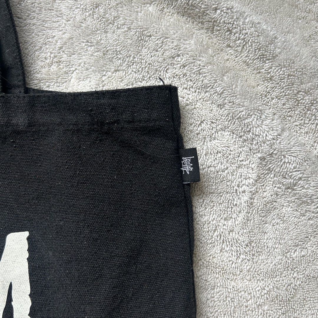 Stussy mini Canvas Tote Bag (Category: Shoulder Bags) located in San Juan City. Submitted by e_declutters2019 (Listing ID 1463786504, Image 2). Description: • damage in the inside pocket • thrifted this on ig - signs of usage .