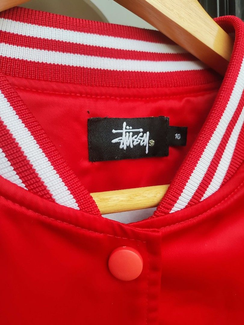 Stussy Tribe Varsity Jacket (Category: Tshirts & Polo Shirts ) located in Quezon City. Submitted by oldsoulv1 (Listing ID 1463781678, Image 3). Description: Stussy Tribe Varsity Jacket Double lining dimes: kindly check the last 2 slides Boxy Fit issues: runs (for safety) and stain seen on pic 2500+SF Quezon City 📍.