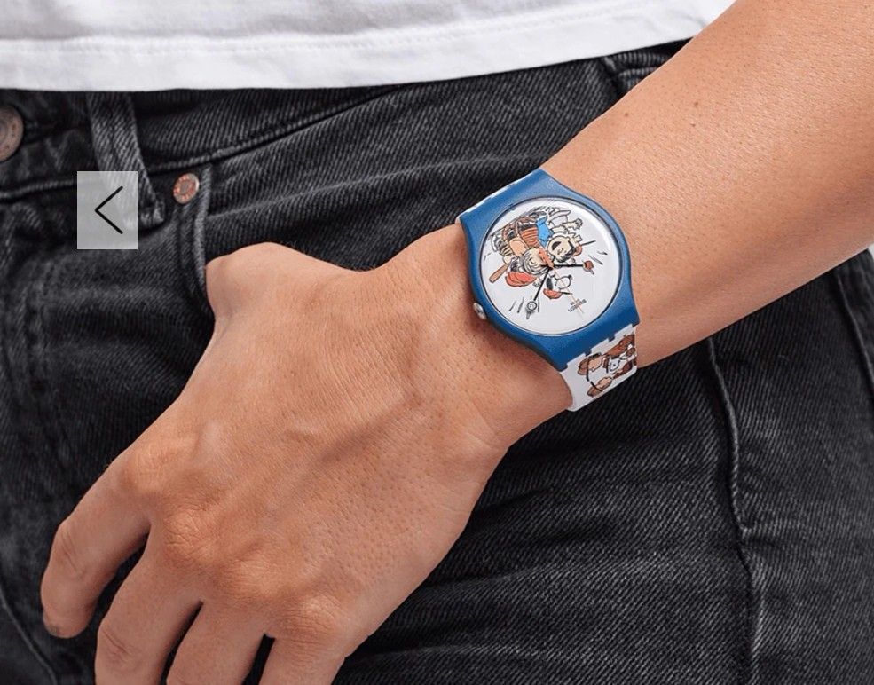 Swatch Peanuts "Time to Play" Watch (Category: Women's Watches) located in Quezon City. Submitted by uptrendglam (Listing ID 1463865178, Image 2). Description: - Swatch watch featuring the Peanuts gang playing baseball. - Panoramic strap design with all the characters. - Watch face shows Charlie Brown and the team in action. - Includes original box with "Clomp" Snoopy illustration. - Perfect collectible for any Peanuts enthusiast. -Minor chip on 