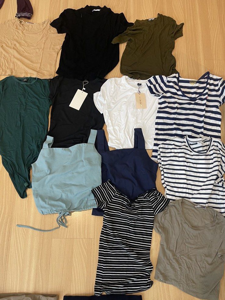 TALE ALL 12 pcs- Tops (XS-S) (Category: Sleeveless) located in Quezon City. Submitted by brightwolf_7ef5d3 (Listing ID 1463793273, Image 1). Description: - Bundle includes t-shirts, a striped dress, and polka dot shorts. - Features various colors and styles. - Some items still have original tags attached. - Perfect for creating a versatile wardrobe. - All items are clean and ready to wear..