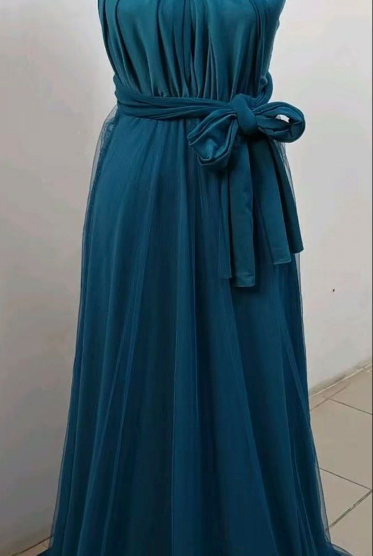 Teal Blue Infinity Dress with Tulle (Category: Evening dresses & gowns) located in Caloocan City. Submitted by mkjh_ (Listing ID 1463932558, Image 3). Description: MAID OF HONOR / BRIDESMAID TEAL BLUE DRESS 💙 ₱300 only! • Once worn • Teal blue • SMALL-MEDIUM SIZE • Perfect for weddings, events, or formal occasions • Good condition • RFS: No longer needed PM me if interested! 😊.