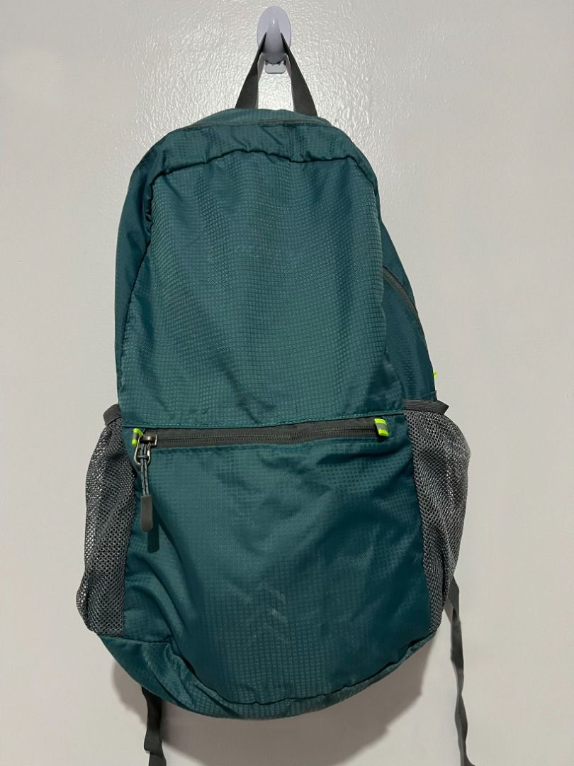 Teal Foldable Travel Backpack with Mesh Pockets (Category: Backpacks) located in Davao. Submitted by jpnusapasabuyfindsdvo (Listing ID 1463903629, Image 2). Description: Eddie Bauer Stowaway Packable 20L Backpack (Dark Green/Teal) - Teal foldable backpack - Two mesh side pockets for water bottles or small items - Front zippered pocket for quick access - Adjustable shoulder straps - Lightweight and easy to pack away - Ideal for travel or day trips