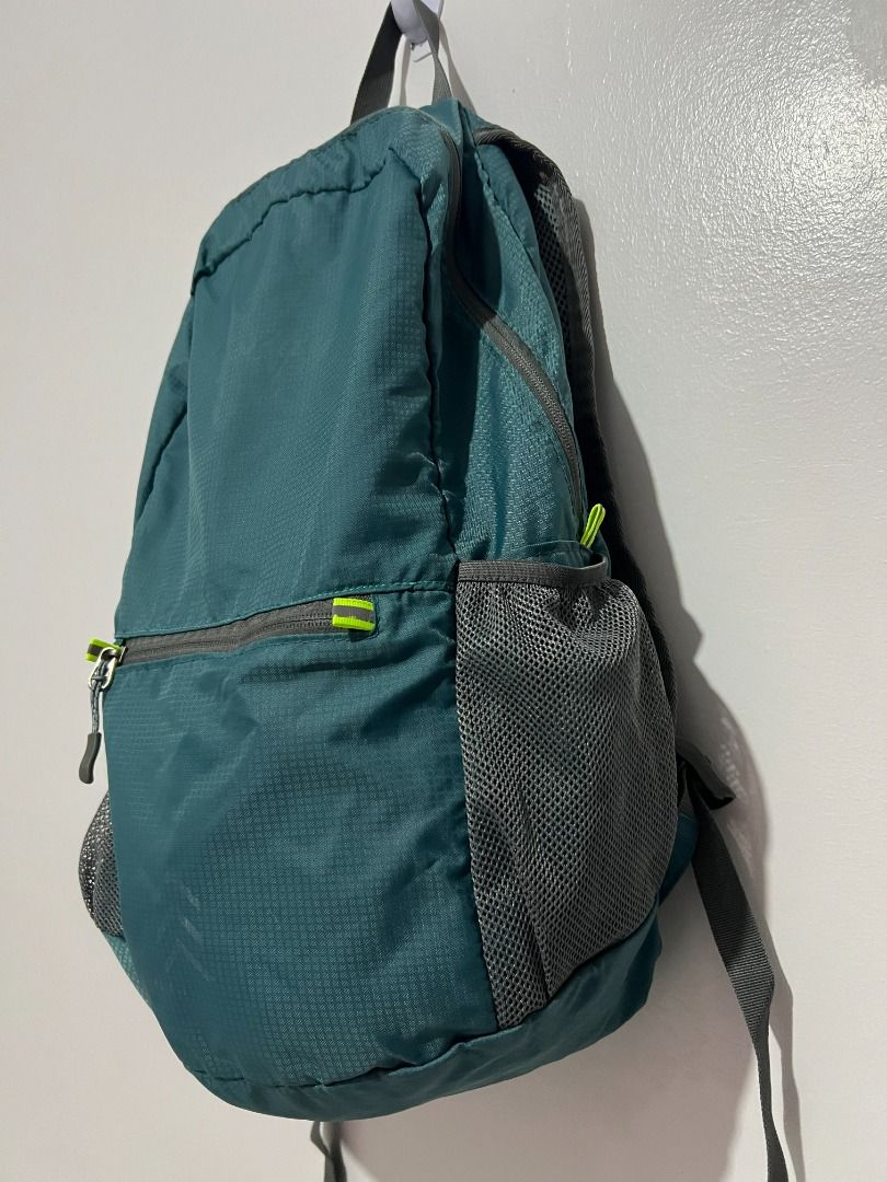 Teal Foldable Travel Backpack with Mesh Pockets (Category: Backpacks) located in Davao. Submitted by jpnusapasabuyfindsdvo (Listing ID 1463903629, Image 3). Description: Eddie Bauer Stowaway Packable 20L Backpack (Dark Green/Teal) - Teal foldable backpack - Two mesh side pockets for water bottles or small items - Front zippered pocket for quick access - Adjustable shoulder straps - Lightweight and easy to pack away - Ideal for travel or day trips