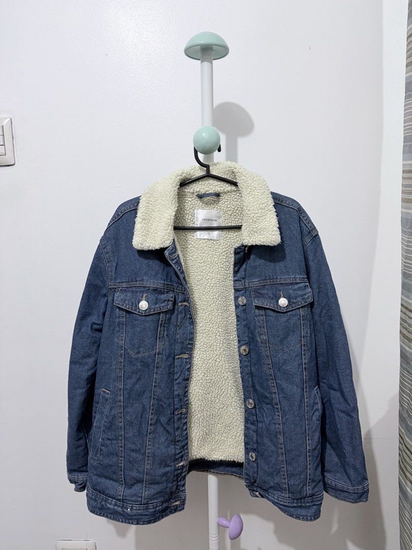 Terranova Denim Jacket (Category: Coats, Jackets and Outerwear) located in Manila. Submitted by closet1993__ (Listing ID 1463879740, Image 1). Description: - Classic blue denim jacket - Lined with warm sherpa for extra coziness - Button-up front and pockets - Ideal for cooler weather - Versatile and easy to style.
