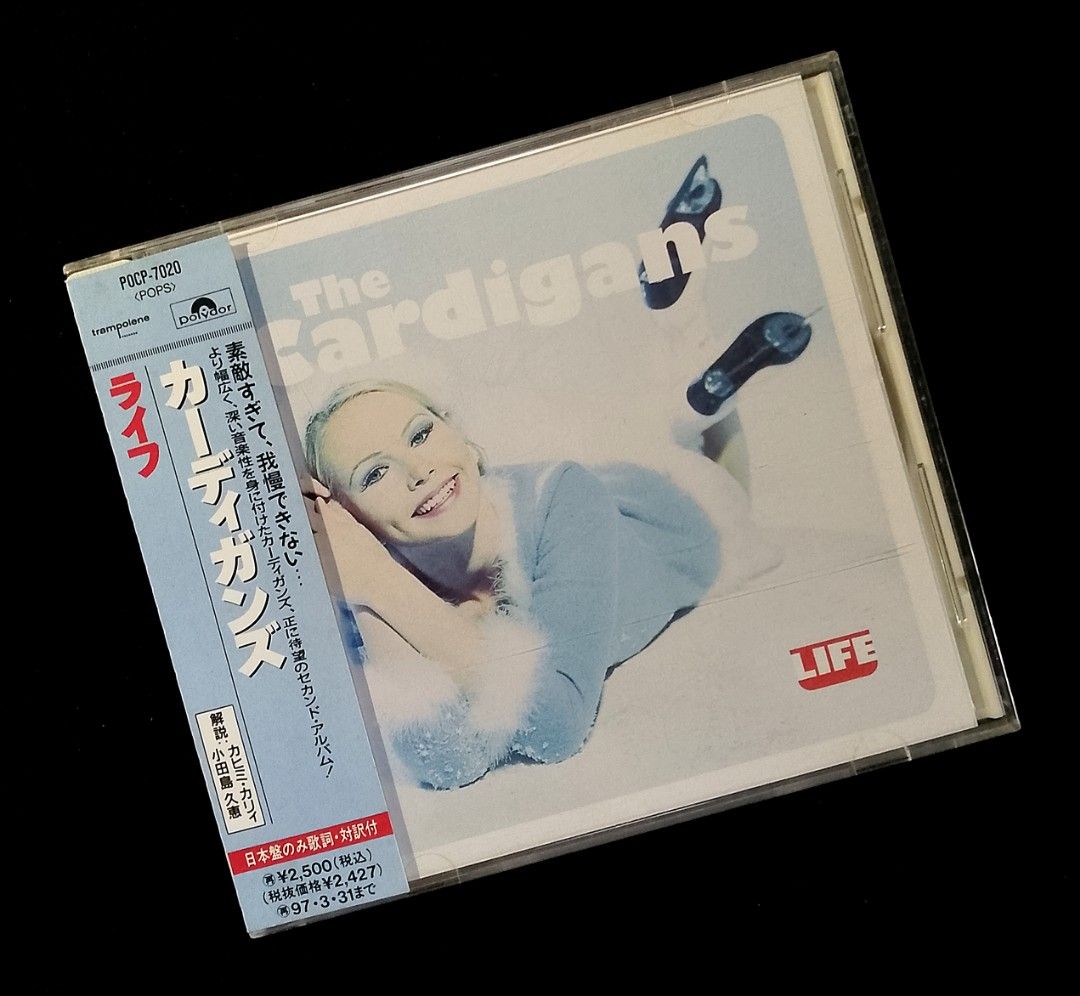 The Cardigans - Life (1995) Japan Press (Category: CDs & DVDs) located in Manila. Submitted by musicsectionph (Listing ID 1463922693, Image 1). Description: ‎FOR SALE: ‎The Cardigans' explosive 1995 indie pop masterpiece "Life" flagship release! ‎ ‎ABOUT THIS ALBUM: ‎This is the legendary Swedish pop band's massive second studio triumph, produced by Tore Johansson. It features their signature brilliant blend of sunny, lounge-inspired melodies, 19