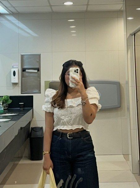 The Unit Made White Eyelet Puff Sleeve Top (Category: Blouses) located in Imus. Submitted by ann.declutters22 (Listing ID 1463751469, Image 3). Description: - White puff sleeve top from The Unit - Made in Korea - All-over eyelet detailing - Ruffled neckline - Elasticated hem - Super cute and summery vibe - Versatile for dressing up or down.