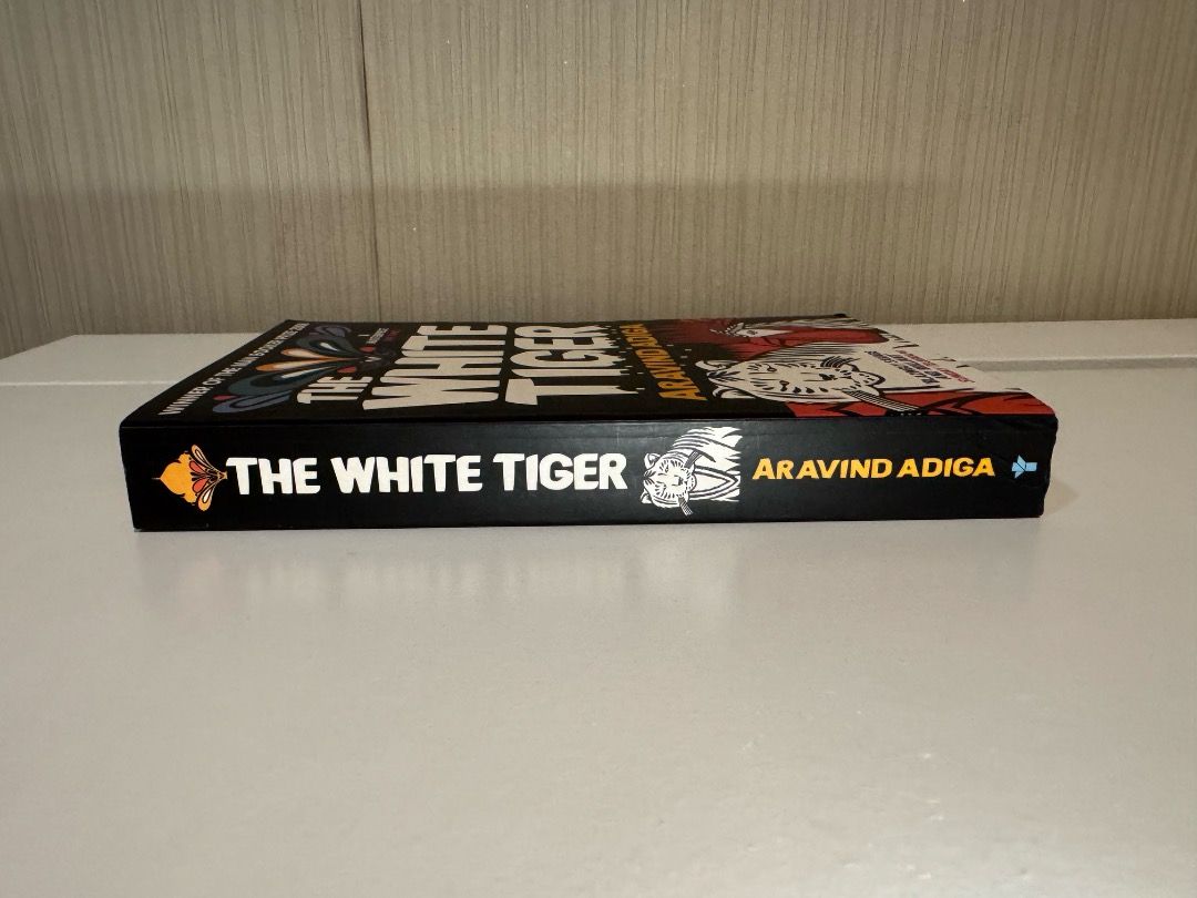 The White Tiger by Aravind Adiga - Paperback (Category: Storybooks) located in Quezon City. Submitted by pinkc0conut (Listing ID 1463937303, Image 3). Description: The White Tiger - Authentic copy - Flaws: few foxing on edges (see photos) - Mode of Payment: GCash, payment first.