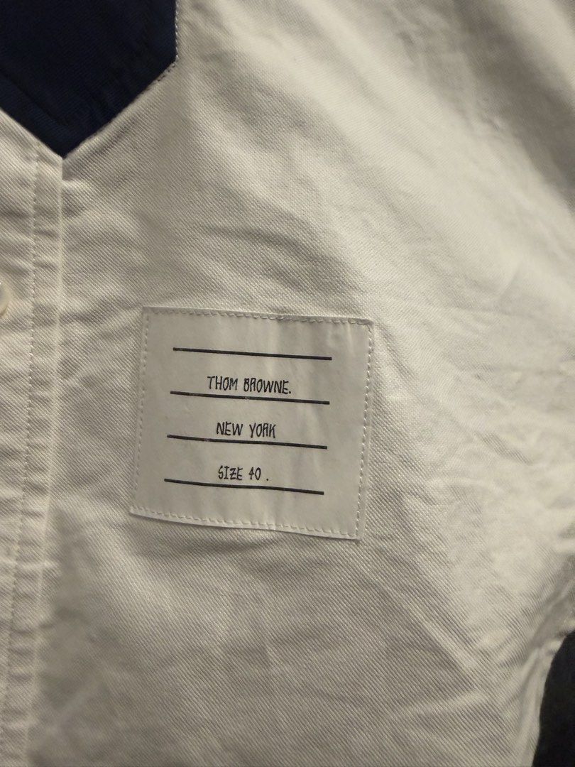 Thom Browne (Category: Longsleeves) located in Quezon City. Submitted by macleen17 (Listing ID 1463832963, Image 3). Description: Thom browne Size 40 Excellent Condition White color Necktie design iconic Color of thom browne Made in italy.