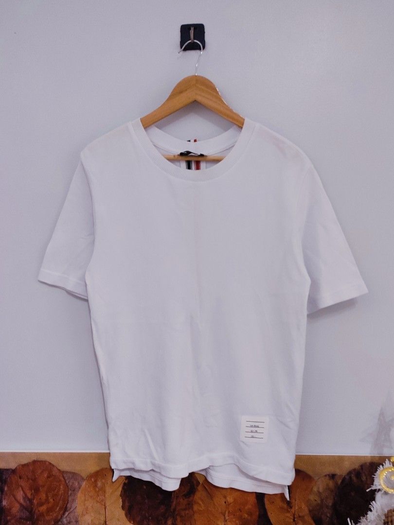 Thom Browne Shirt (Category: Luxury Apparel) located in Ibajay. Submitted by trendholicrepublique (Listing ID 1463895750, Image 1). Description: Off/Legit Thom Browne Shirt 459 PHP Color Rate 9.5/10 Medium Size (20 x 27.5) Very Good to Excellent Condition (need wash) Issue: minimal hawa.