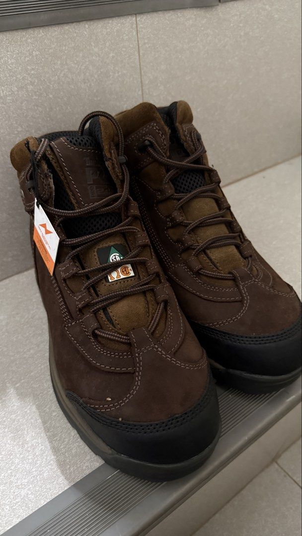 Timberland PRO Men's Brown Leather Work Boots (Category: Boots) located in Mandaluyong City. Submitted by arlorebecc47663 (Listing ID 1463793251, Image 1). Description: - Timberland PRO Work Boots - Color: Brown - Materials: Leather and Suede - Style: Lace-up - Size: 8W (US Men's) - Designed in New Hampshire, USA - Made in Bangladesh - Ideal for work and outdoor activities - Durable and comfortable construction - No box.