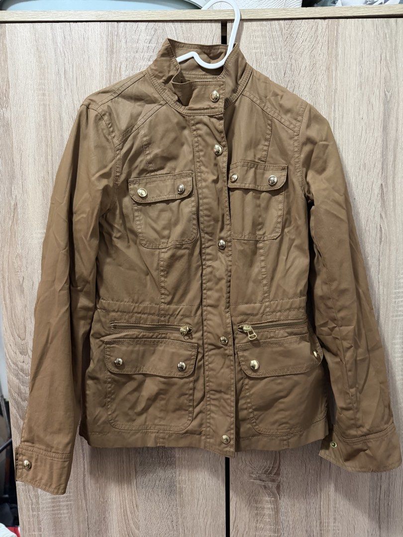 Tommy Hilfiger Brown Jacket (Category: Coats, Jackets and Outerwear) located in Quezon City. Submitted by krtstn (Listing ID 1463802659, Image 1). Description: .