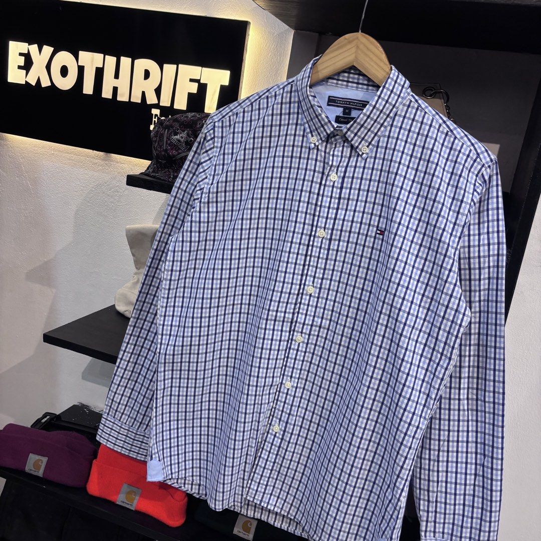 Tommy Hilfiger button down (Category: Activewear) located in Rizal. Submitted by doyskie.star (Listing ID 1463797596, Image 2). Description: TOMMY HILFIGER STRIPS POLO LONG SLEEVE 20 by 27front 28back Necktag only.