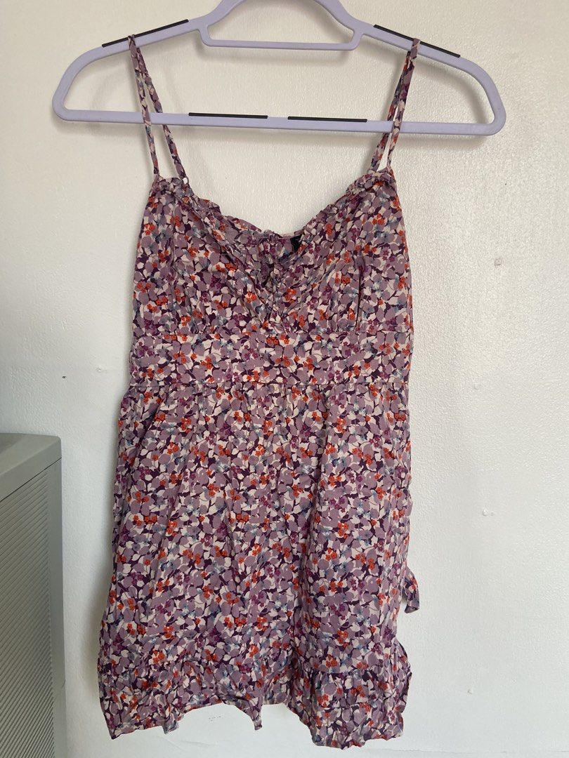 Topshop Floral Spaghetti Straps (Category: Dresses) located in Bacoor. Submitted by maybellescloset (Listing ID 1463757634, Image 1). Description: Bought in Dubai UAE RFS: decluttering No issues like new fits medium to semi large Payment: bpi or gcash Shipment: jnt - Cute floral print mini dress from Topshop - Features spaghetti straps - Tie detail at the waist - Lovely mix of purple, pink, and orange flowers - Ideal for casual outings or summer 