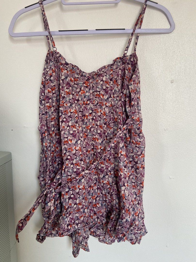 Topshop Floral Spaghetti Straps (Category: Dresses) located in Bacoor. Submitted by maybellescloset (Listing ID 1463757634, Image 3). Description: Bought in Dubai UAE RFS: decluttering No issues like new fits medium to semi large Payment: bpi or gcash Shipment: jnt - Cute floral print mini dress from Topshop - Features spaghetti straps - Tie detail at the waist - Lovely mix of purple, pink, and orange flowers - Ideal for casual outings or summer 