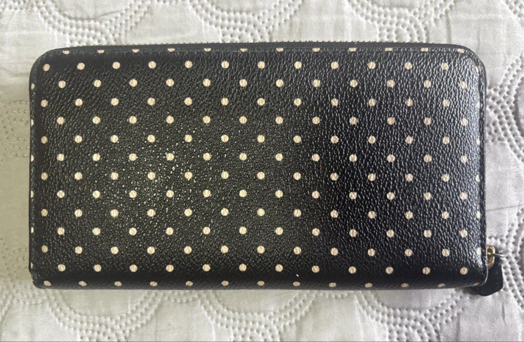 Tory Burch Black Polka Dot Zip Around Wallet (Category: Luxury Bags & Wallets) located in Paranaque City. Submitted by maishoppe17 (Listing ID 1463797545, Image 3). Description: Selling my Tory Burch leather wallet 🩷 - Color: Cute Black with white polka dots - Closure: Zip around - Hardware: Gold tone - Interior: Multiple card slots, zippered compartment - Includes: Tory Burch gift bag Very clean ✨☺️! .