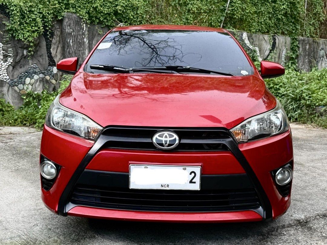 Toyota Yaris 1.3 (A) (Category: Used Cars) located in Makati City. Submitted by lg_sy (Listing ID 1463784907, Image 2). Description: Toyota Yaris E 1.3 2014 Automatic Transmission 134,xxx odo Red Mica Metallic Plate ending 2 Original owner Complete and clean papers Registered until Feb 2027 Cold aircondition Not flooded as is where is Upgrades: VLF-38 silver mags Kyoei lug nuts Carplay & Android Auto screen Chrome trunk bar & door handles All LED