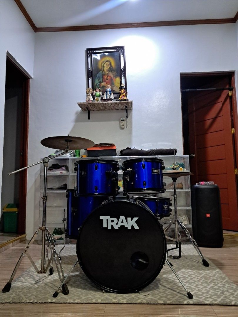 TRAK Drum Set with Cymbals and Pedals (Category: Musical Instruments) located in Manila. Submitted by wildfalcon_b4744f (Listing ID 1463775979, Image 1). Description: - Full drum set for sale - Includes bass drum, toms, snare, cymbals, and pedals - Attractive blue finish on drums - Ready for practice or performance - Minor cosmetic wear on cymbals and pedals from normal use - Perfect for drummers of all levels - Slighlty Negotiable.