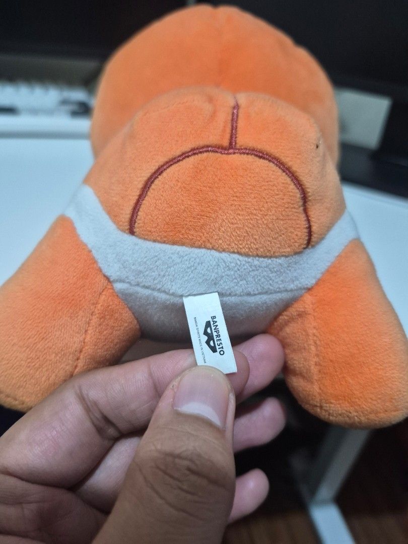 Trapinch Banpresto Pokemon Plushie (Category: Plushies & Soft Toys) located in Binangonan. Submitted by oyiebhoy (Listing ID 1463789021, Image 2). Description: - Adorable orange plush toy - Unique black zig-zag line on head - Cute star-shaped eye - White stripe on belly - Super soft and cuddly - Ideal gift for Pokemon enthusiasts.
