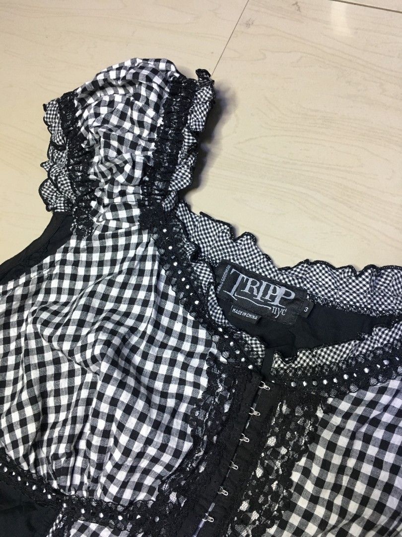 Tripp NYC Black Gingham Corset Top (Category: Sleeveless) located in Cabuyao City. Submitted by roronhilira (Listing ID 1463936495, Image 3). Description: TRIPP NYC * GINGHAM TOP SIZE 3 FIT XL 22 pit to pit 23 length excellent condition 1k shipped DM 📥.