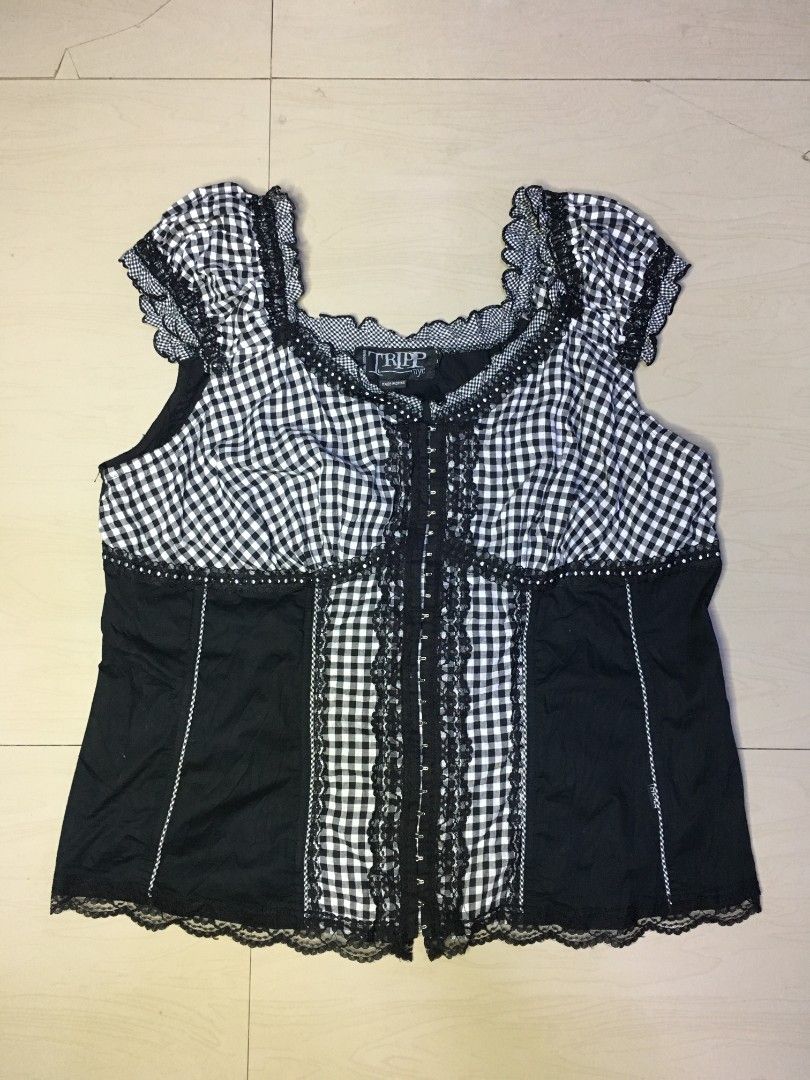 Tripp NYC Black Gingham Corset Top (Category: Sleeveless) located in Cabuyao City. Submitted by roronhilira (Listing ID 1463936495, Image 1). Description: TRIPP NYC * GINGHAM TOP SIZE 3 FIT XL 22 pit to pit 23 length excellent condition 1k shipped DM 📥.