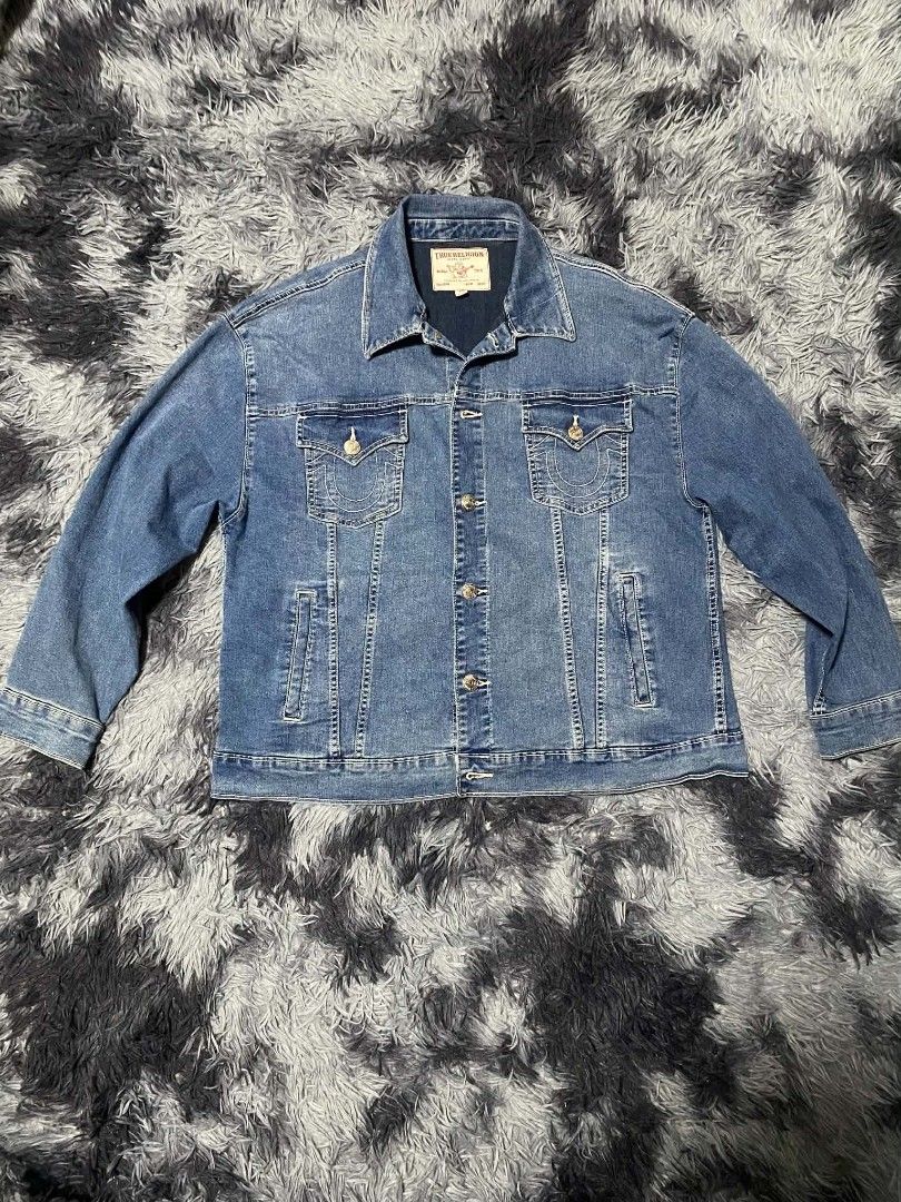 True Religion Denim Jacket - Large Logo Back (Category: Coats, Jackets and Outerwear) located in Manila. Submitted by skinad (Listing ID 1463829979, Image 2). Description: - Classic blue denim jacket - True Religion brand - Iconic horseshoe logo and brand name printed on back - Button-up front - Chest pockets - Ideal for layering - Wardrobe staple dimes 24x28 size XL on tag no issue good asnew can do shipping vouch/videocall/proof.