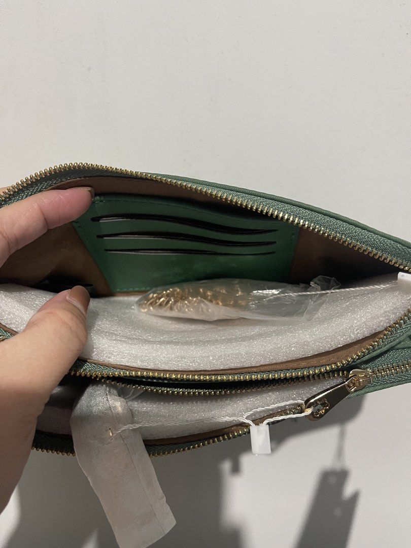 TTWN Bear Pouch (Category: Purses & Pouches) located in Iloilo. Submitted by myjanna (Listing ID 1463864060, Image 3). Description: - Cute green pouch set with embroidered bear design. - Features two zippered compartments for organization. - Includes card slots inside. - Stylish gold zipper details. - Perfect for keeping small essentials tidy. - Brand new with tags attached. -Bought in Thailand -Comes with its own dust bag ✅sf c/o buyer ✅payment 