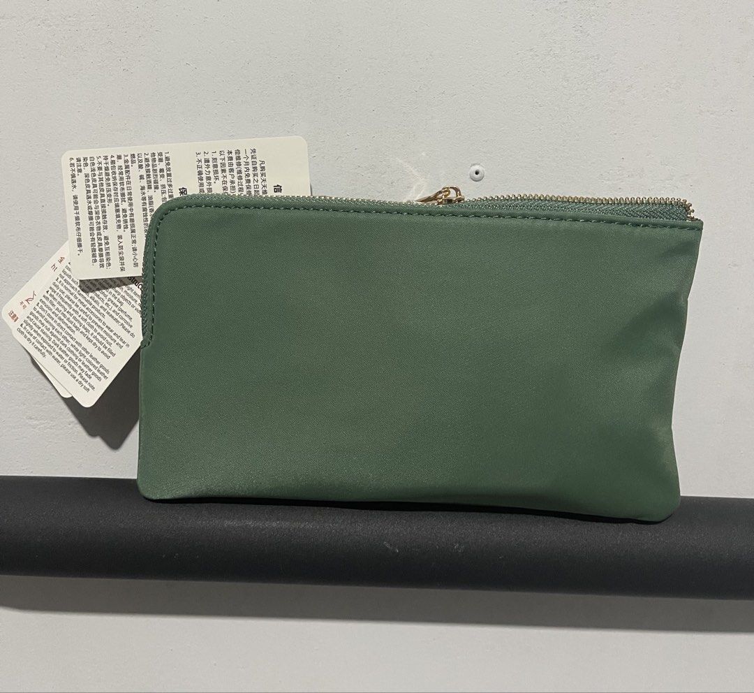 TTWN Bear Pouch (Category: Purses & Pouches) located in Iloilo. Submitted by myjanna (Listing ID 1463864060, Image 2). Description: - Cute green pouch set with embroidered bear design. - Features two zippered compartments for organization. - Includes card slots inside. - Stylish gold zipper details. - Perfect for keeping small essentials tidy. - Brand new with tags attached. -Bought in Thailand -Comes with its own dust bag ✅sf c/o buyer ✅payment 