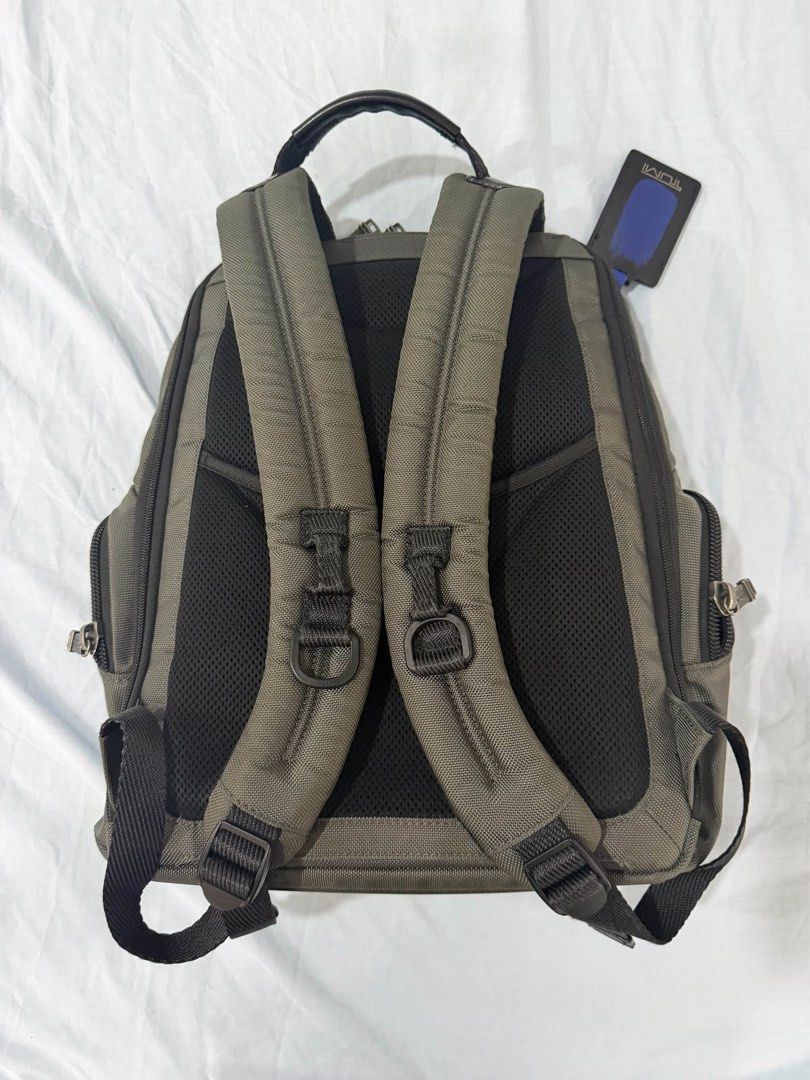 Tumi Backpack Olive Green with Blue Accents (Category: Backpacks) located in Manila. Submitted by gentxt03 (Listing ID 1463744712, Image 2). Description: - Olive green Tumi backpack - Front zip pocket with distinctive blue stripe detail - Padded shoulder straps for maximum comfort - Multiple compartments for excellent organization - Ideal for everyday use or travel adventures - Original price 36k - Bought last 2023 - Negotiable - 100% authentic.