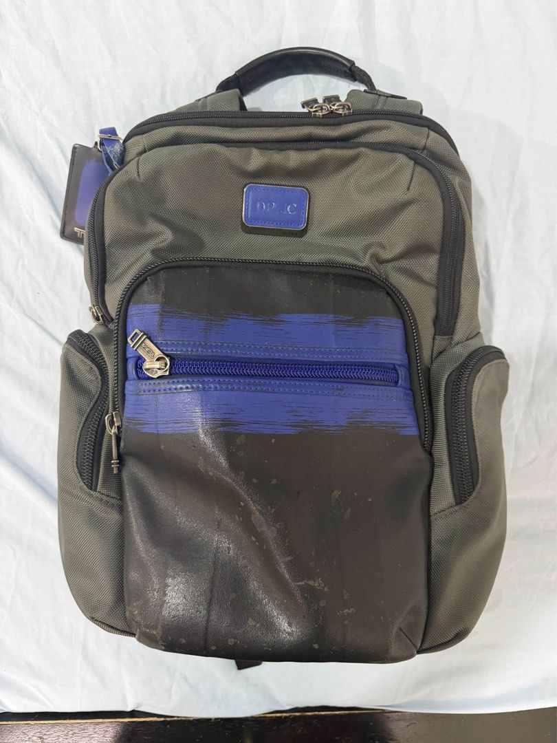 Tumi Backpack Olive Green with Blue Accents (Category: Backpacks) located in Manila. Submitted by gentxt03 (Listing ID 1463744712, Image 1). Description: - Olive green Tumi backpack - Front zip pocket with distinctive blue stripe detail - Padded shoulder straps for maximum comfort - Multiple compartments for excellent organization - Ideal for everyday use or travel adventures - Original price 36k - Bought last 2023 - Negotiable - 100% authentic.