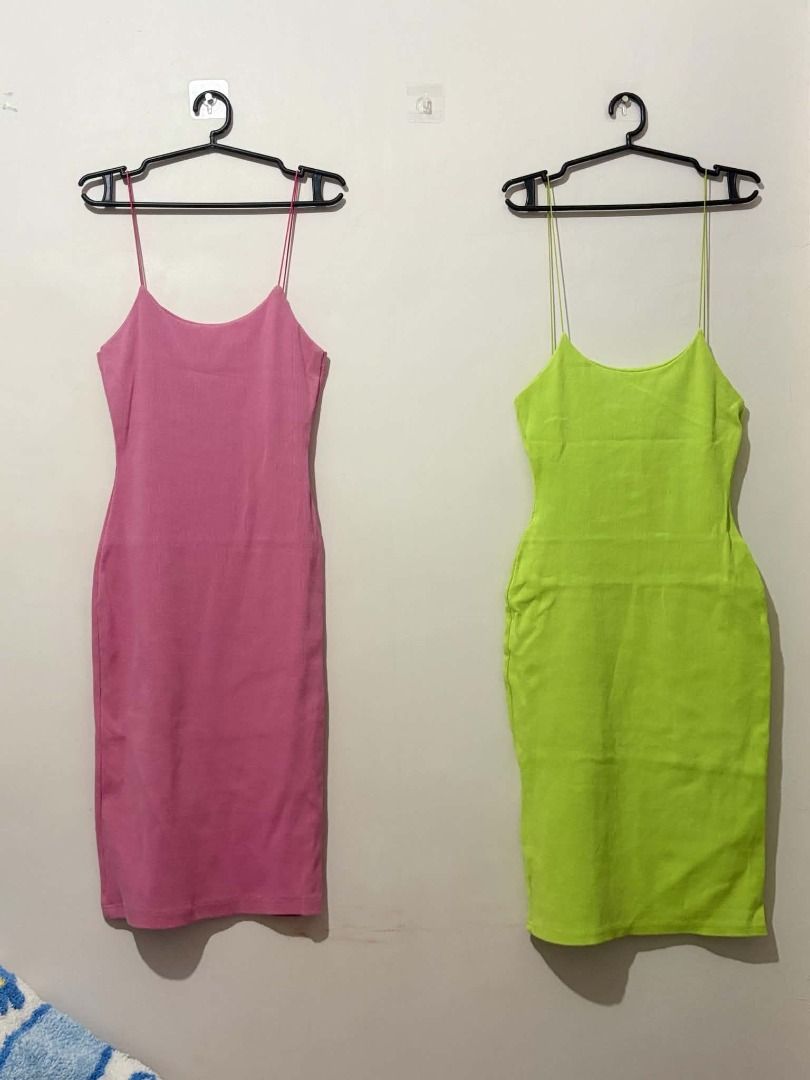 Two Spaghetti Strap Bodycon Dresses - Pink and Lime Green (Category: Dresses) located in San Leonardo. Submitted by burgossanleonardo.12345 (Listing ID 1463910235, Image 1). Description: - Set of 2 spaghetti strap bodycon dresses - Colors: Bright Pink & Vibrant Lime Green - Length: Knee-length - Silhouette: Fitted/Bodycon - Versatile: Great for night outs or casual days - Styling: Easy to pair with accessories.