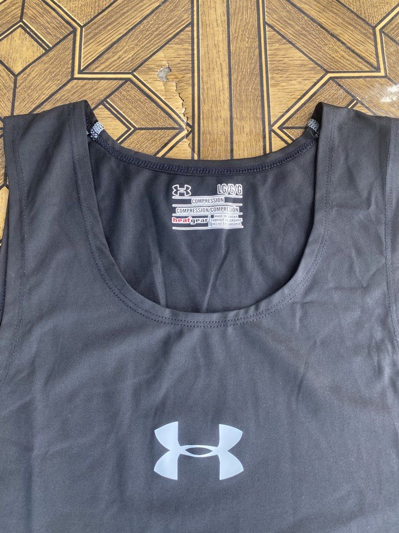 Under Armour Heat Gear Sleeveless Compression (Category: Activewear) located in Pozorrubio. Submitted by eyannn. (Listing ID 1463935478, Image 2). Description: Excellent/As New Condition Color rate 9.8/10 Issue: None❌ Large on tag (Strechable) width: 18 length: 25.