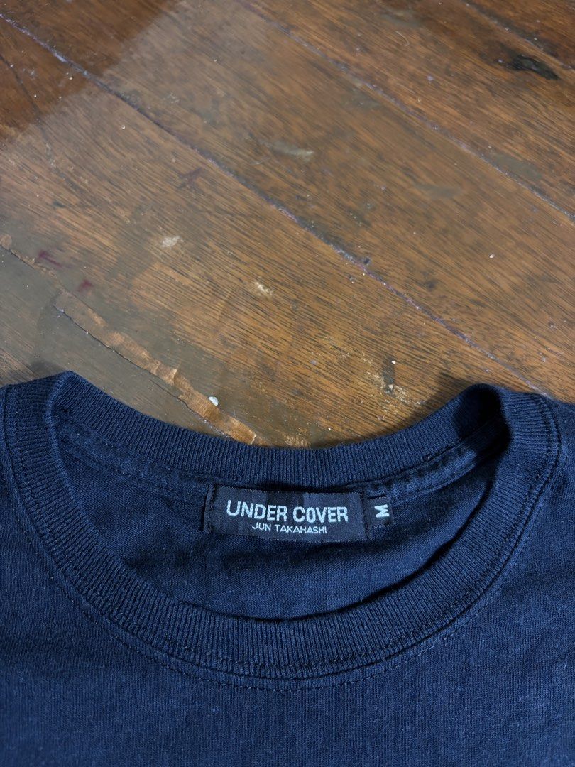 Undercover Brain Burger Bearbrick T shirt (Category: Tshirts & Polo Shirts ) located in Manila. Submitted by earlylifecrisis (Listing ID 1463836767, Image 2). Description: Sz Medium Condition 9/10 Measure it by inch Width: 18.5 Length: 28 Shoulder: 18 Sleeve: 6.5 Bust: 17.5 Hem: 19.5 •Refund / Returns not allowed allowed •Please do check the dimensions size on labels sometimes are not accurate on the sizing •Ask me before purchasing.