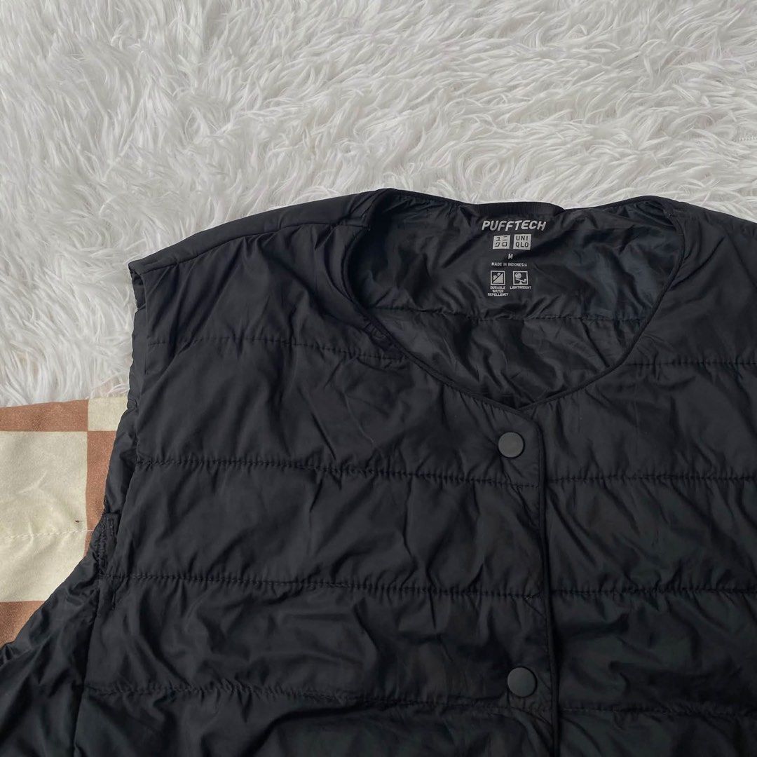 Uniqlo compact pufftech vest (Category: Coats, Jackets and Outerwear) located in Mariveles. Submitted by mariathriftandpreloved (Listing ID 1463869122, Image 2). Description: Uniqlo Women’s pufftech compact vest Med on tag width 20 length 23 black color like new no issue Loc: Bataan Courier: J&T.